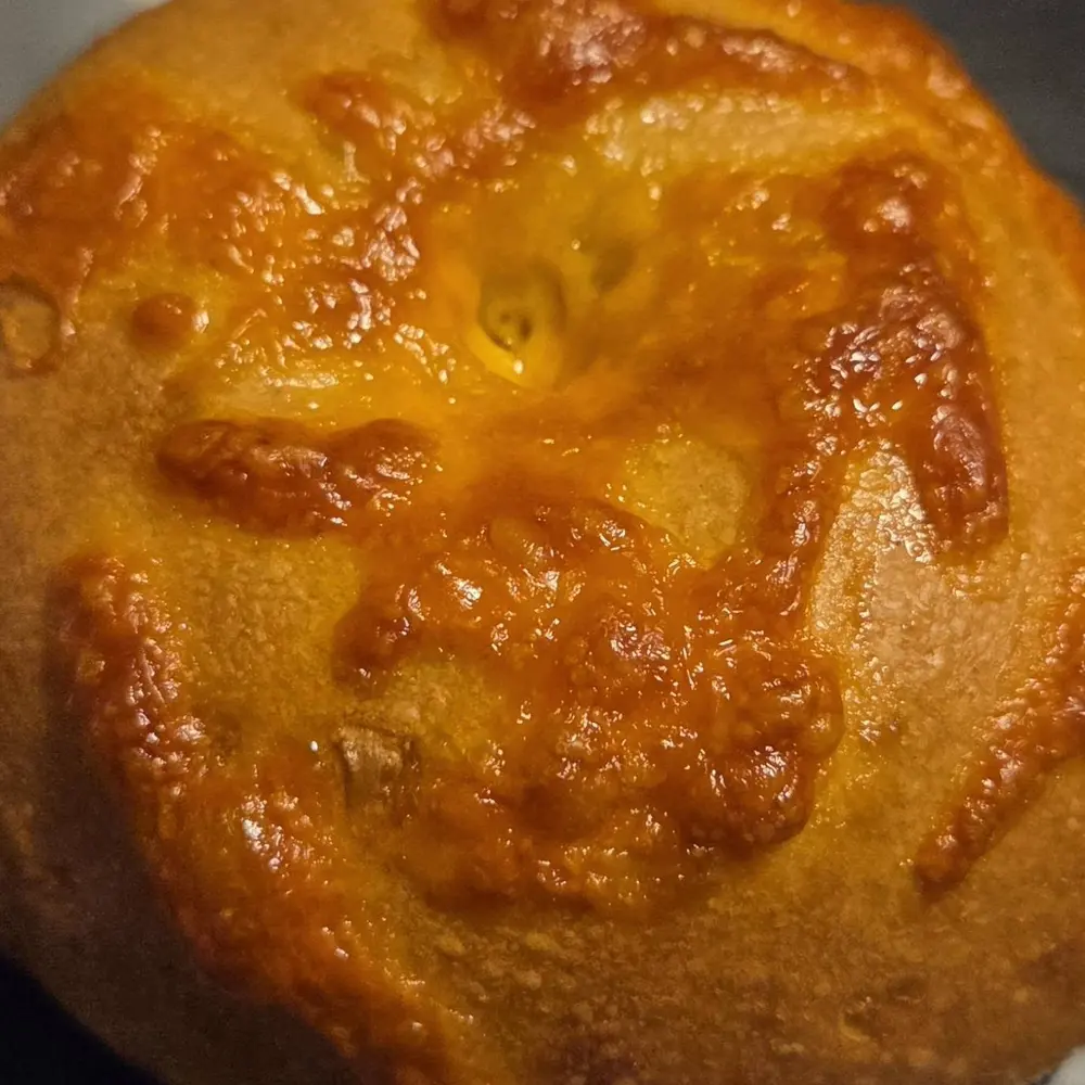 Close-up of a golden cheddar sourdough loaf